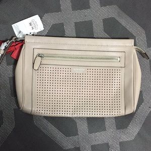 COACH nude perforated clutch